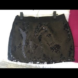 Black sequence mini skirt. New never worn